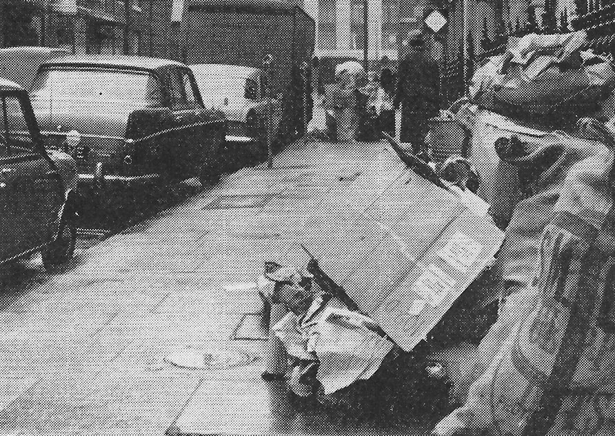 Fig. 169 Margaret Street. Waste material from the ‘rag trade’ is dumped on the pavement for collection.