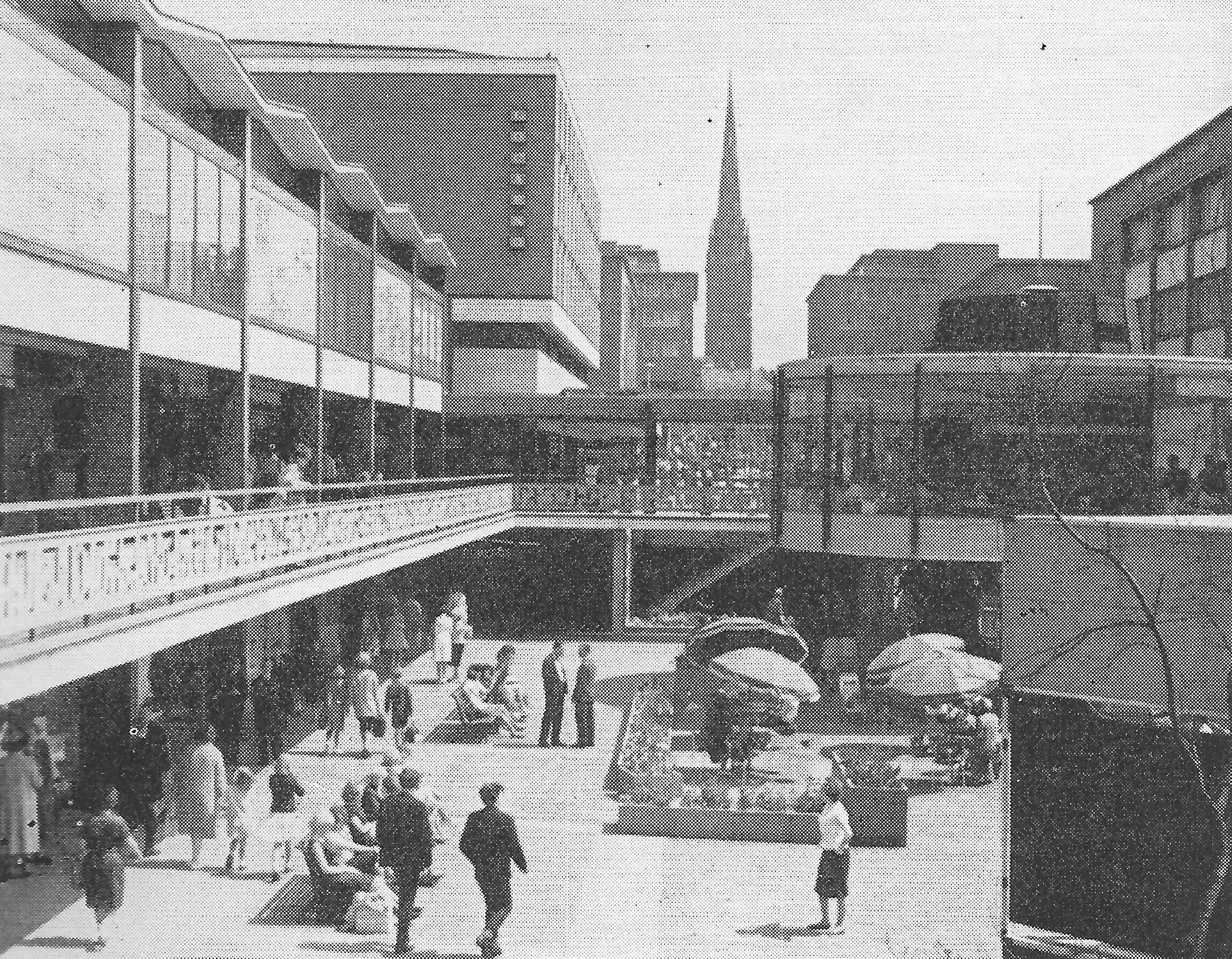 Fig. 221 The upper and lower shopping precincts at Coventry. This is one of the most interesting reconstructions in Europe, designed not only for motor traffic but as a place ‘…where it would be a pleasure just to wander about and sit around’.